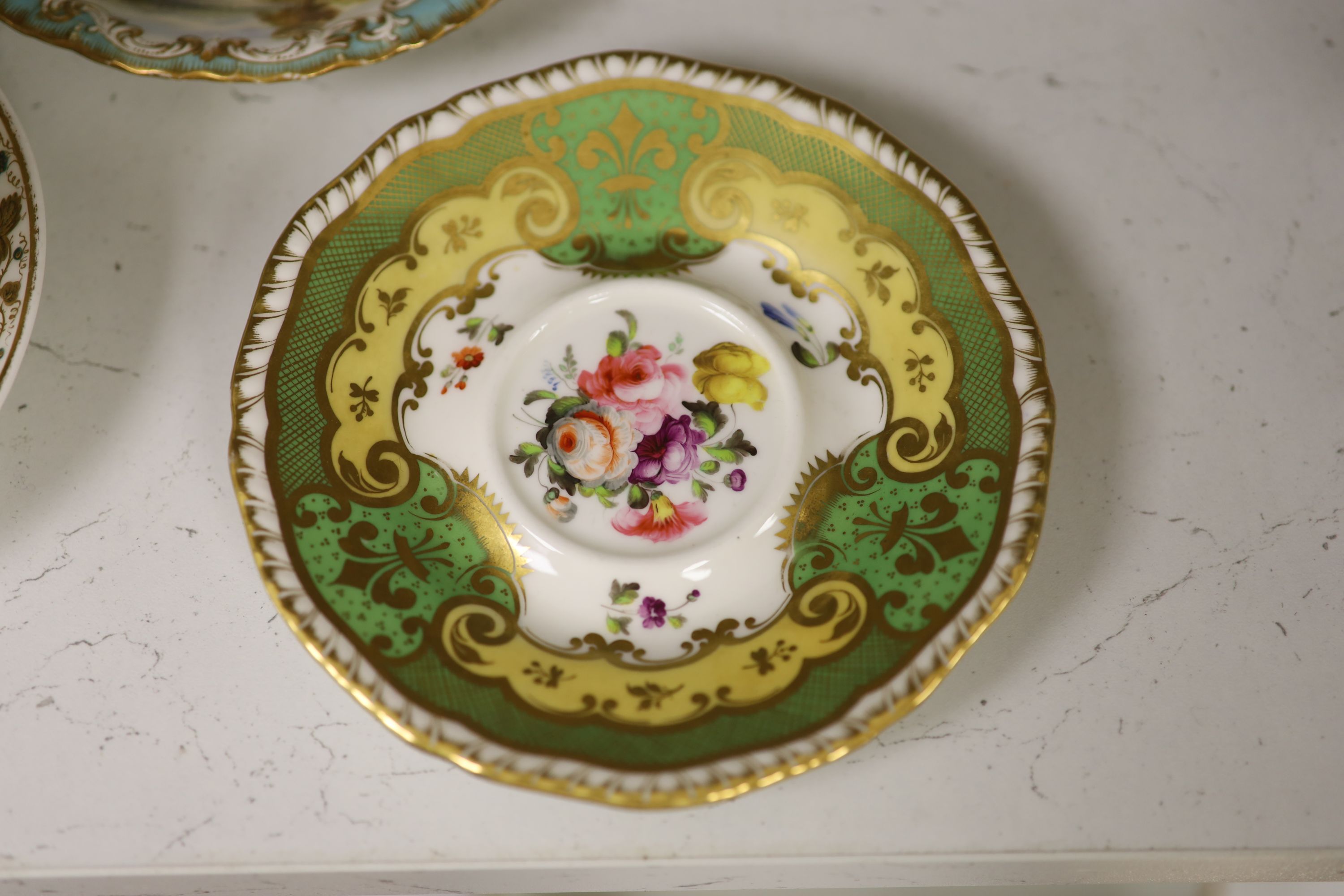 A Spode cup and saucer decorated with raised gilt birds and a basket with green leaves, marked Spode 3916, a Copeland and Garrett turqu